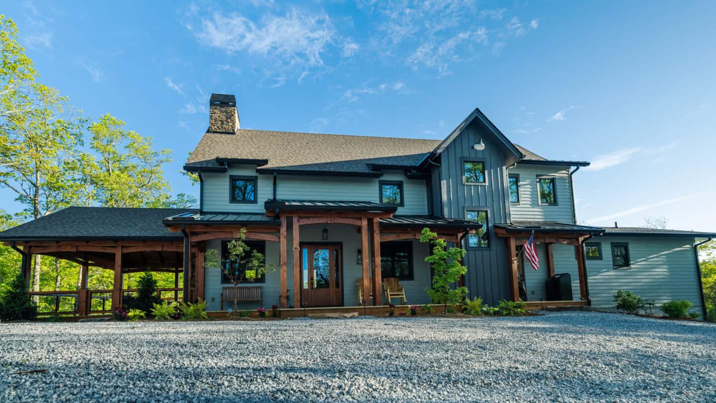 Elegant mountain lodge with natural timber frame construction and scenic lakeside setting, perfect f.